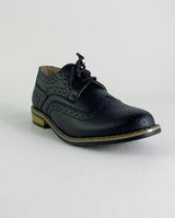Boys classic black wingtip brogue shoe — front view