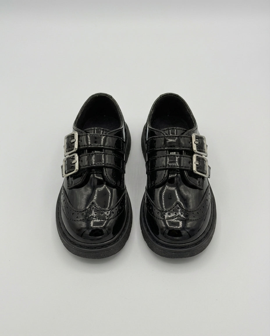 Boys glossy black patent monk shoe — sole view
