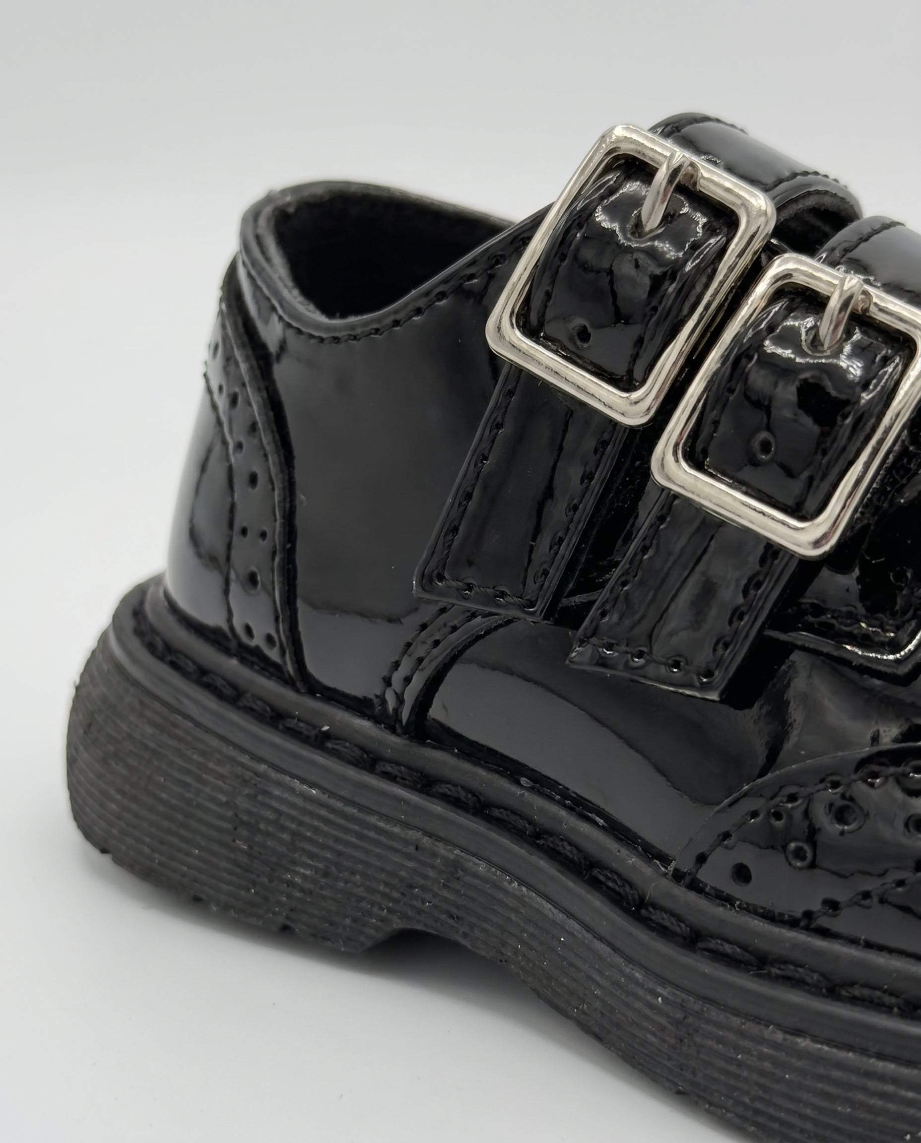 Boys glossy black patent monk shoe — side profile