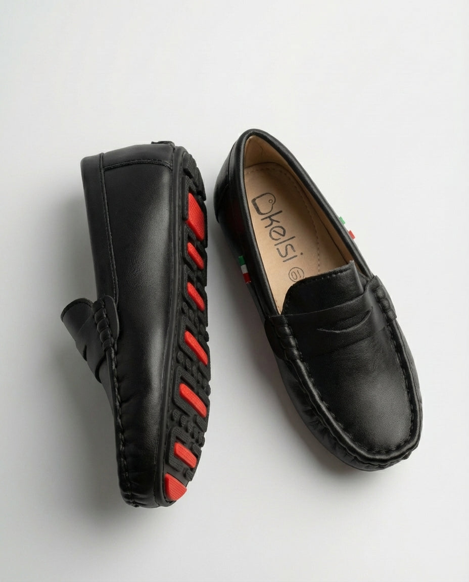 Boys black Milano leather driving loafer — three-quarter angle