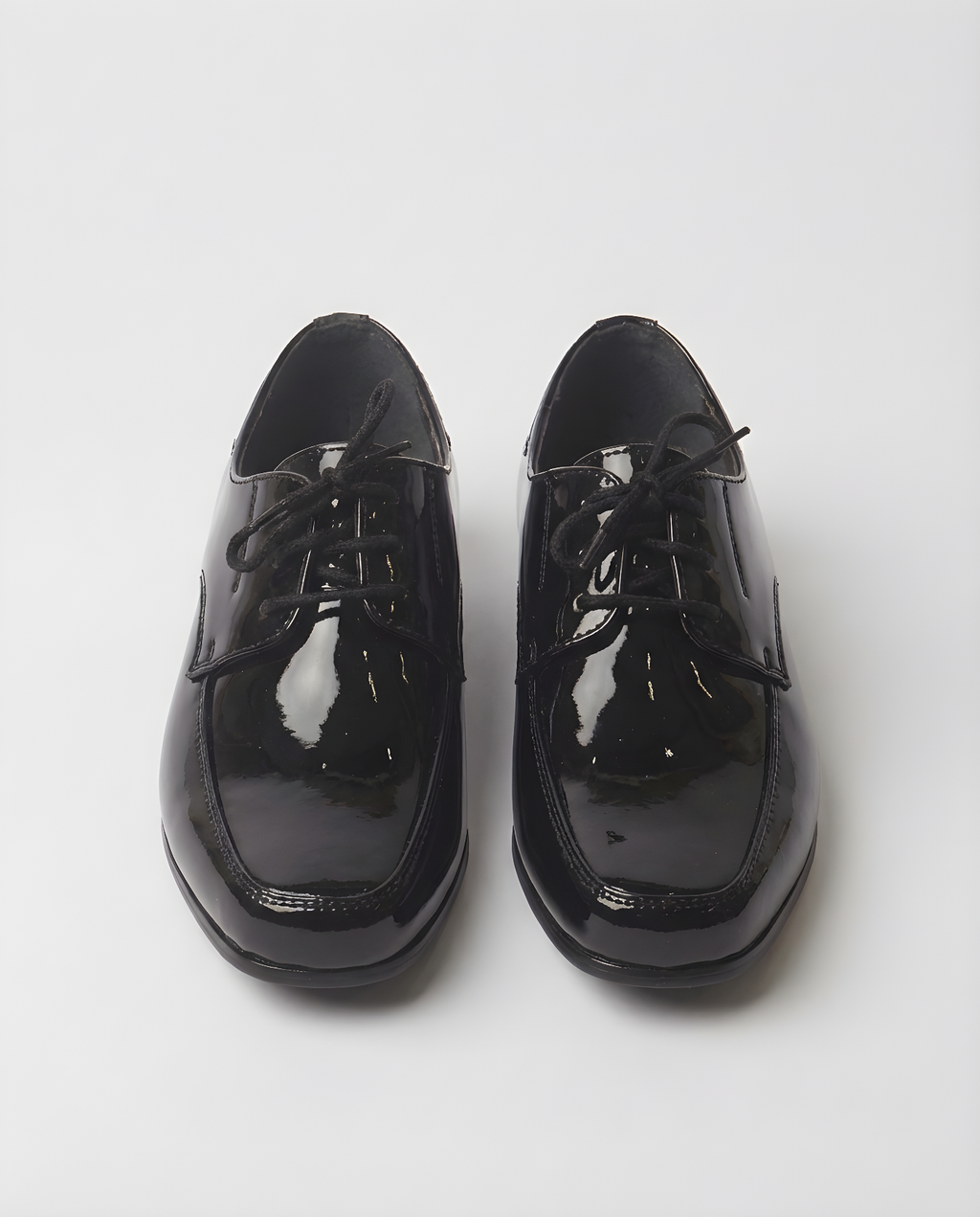 Boys classic black patent derby shoe — sole view