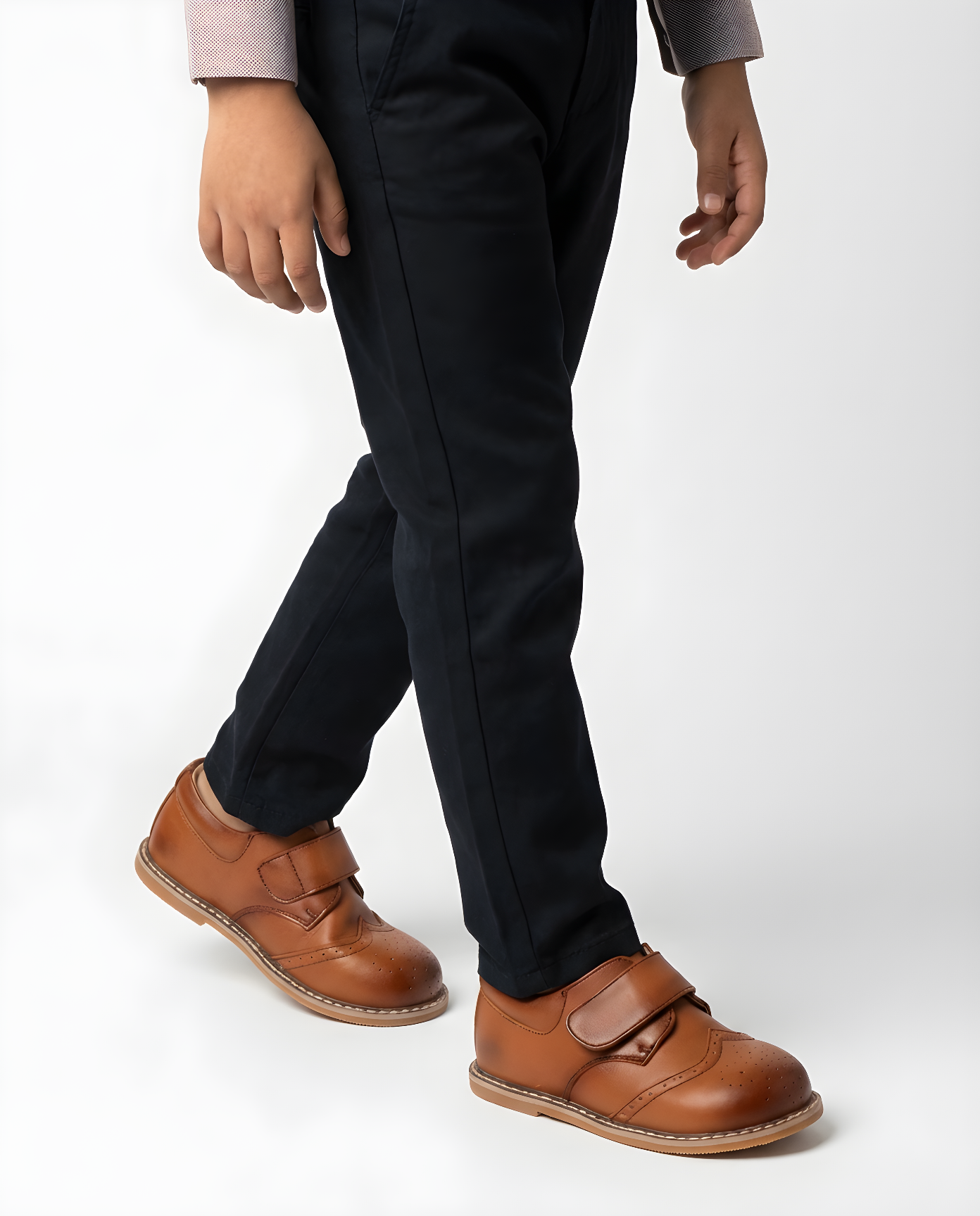 Boys cognac leather wingtip shoe — side profile