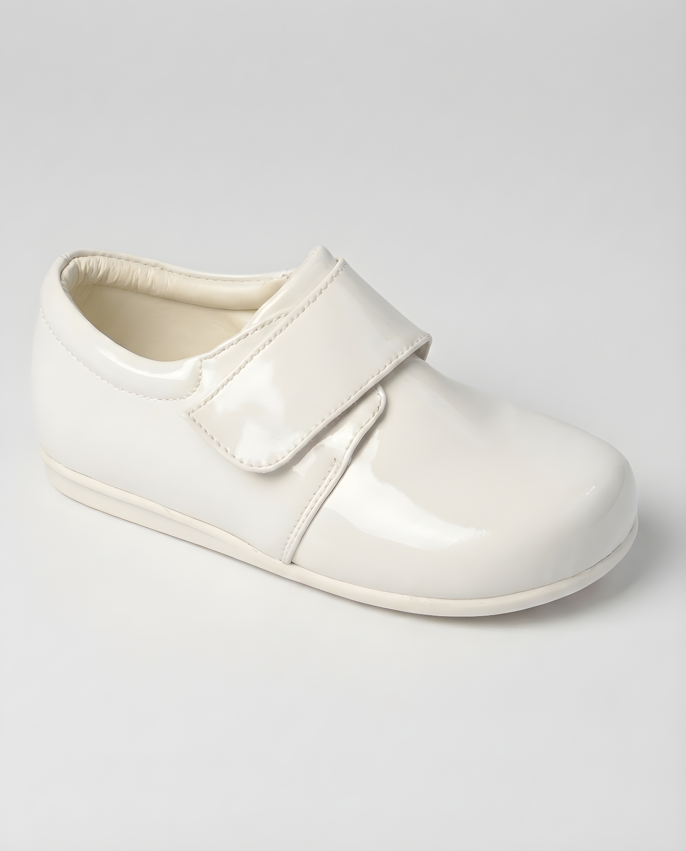 Boys ivory soft sole loafer — front view
