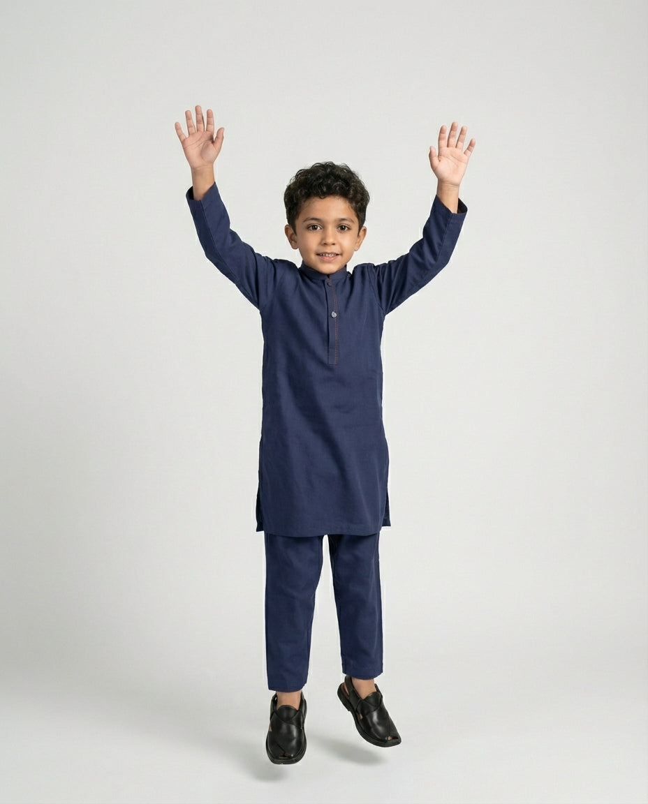 Boys shalwar kameez side view showing relaxed cut