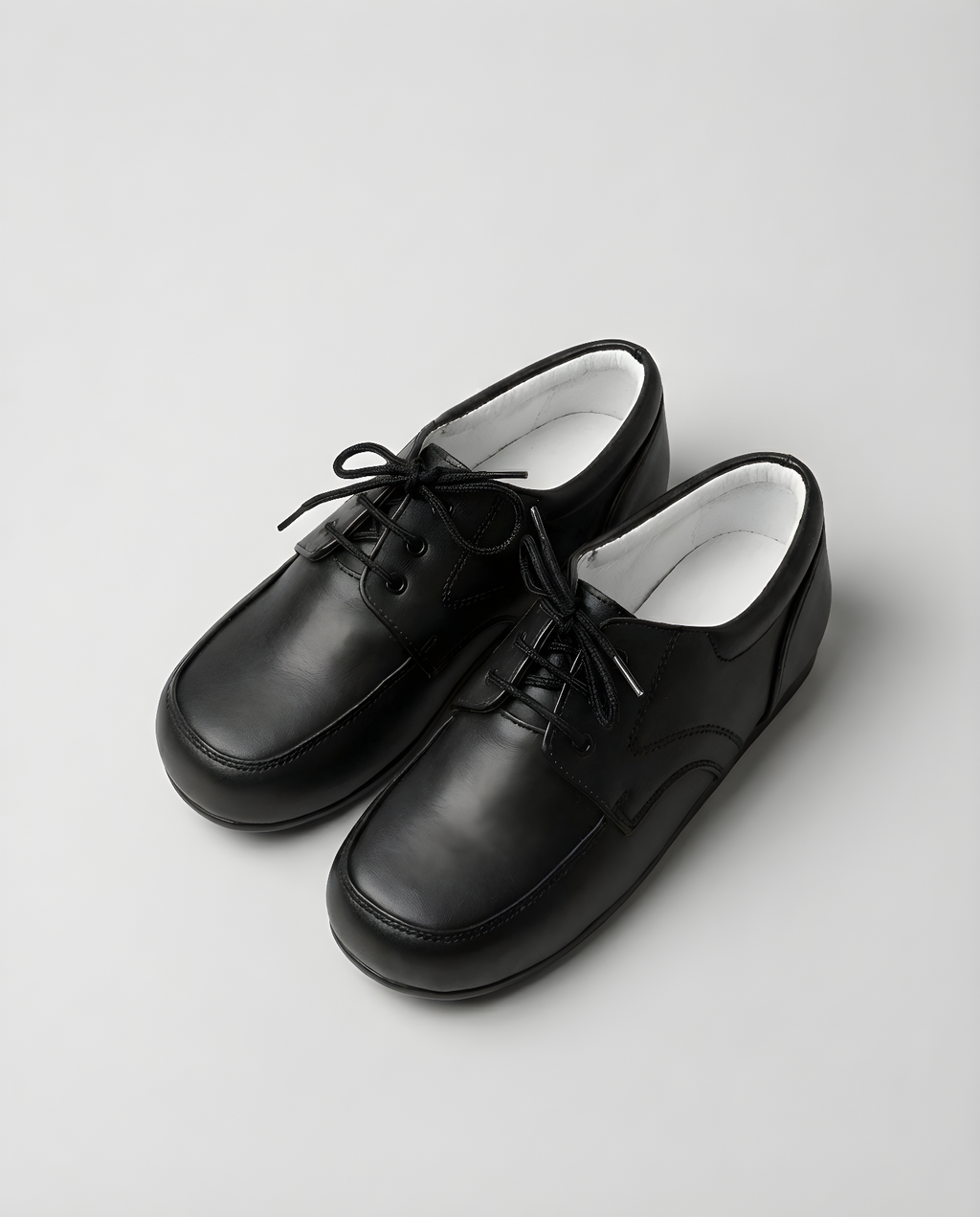 Boys classic black leather derby shoe — front view