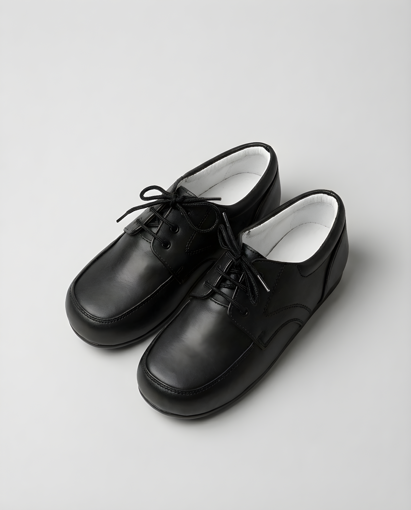 Boys classic black leather derby shoe — front view