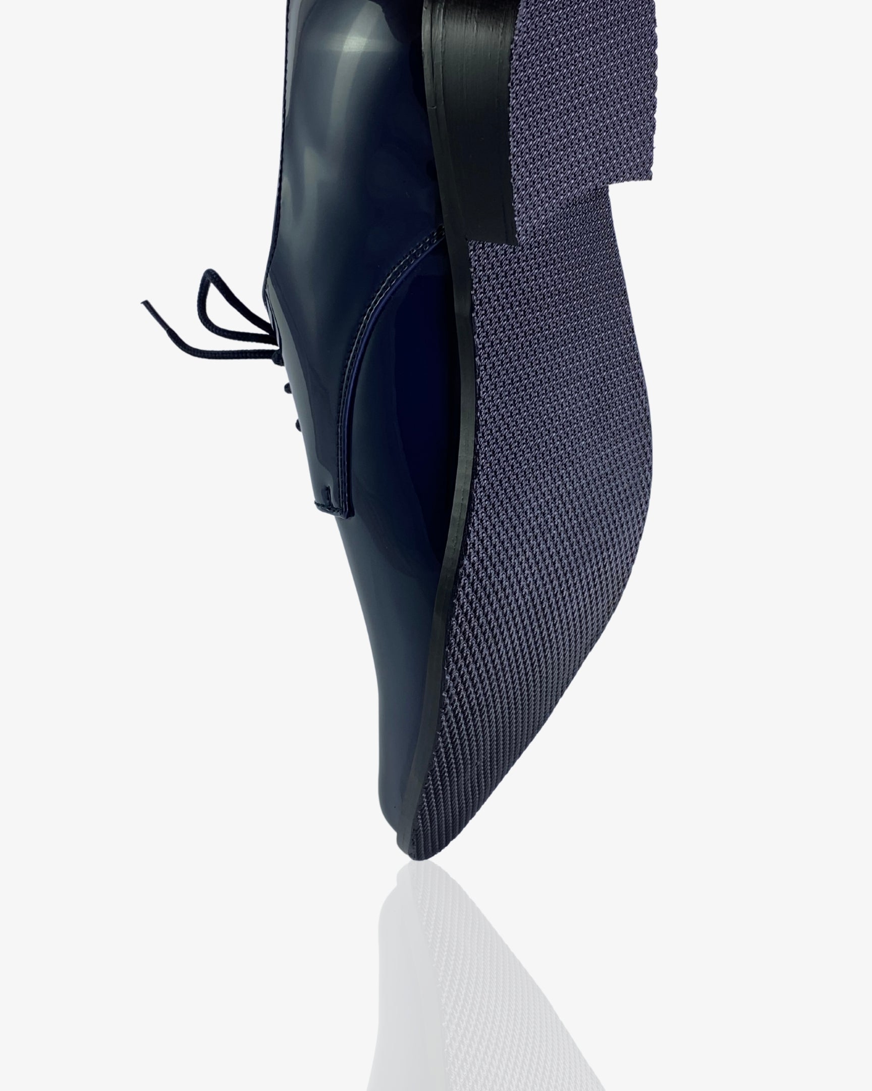 Boys navy patent derby shoe — three-quarter angle