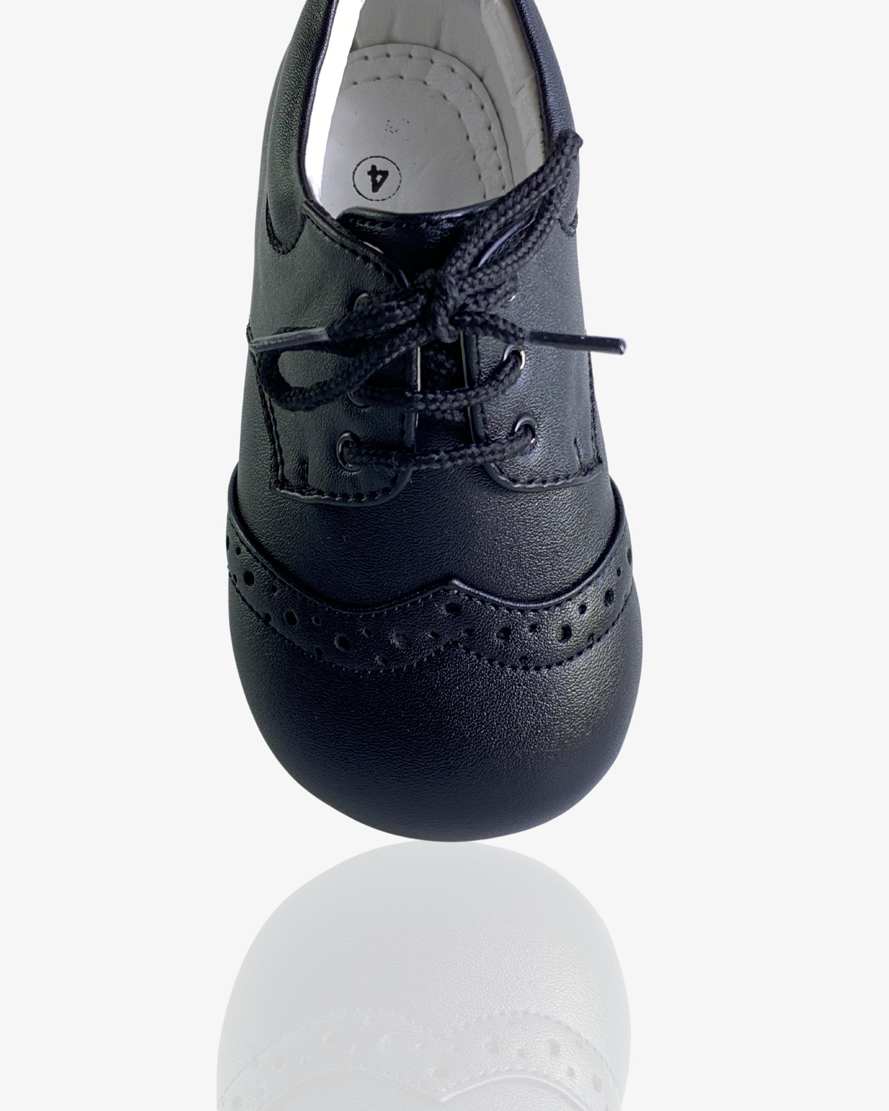 Boys classic black leather brogue shoe — sole view