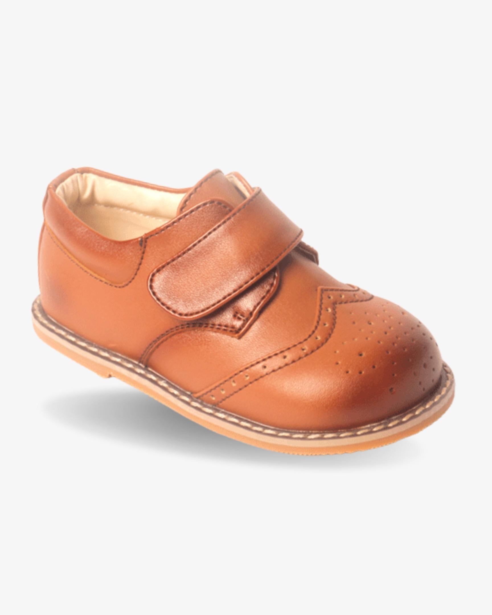Boys cognac leather wingtip shoe — front view