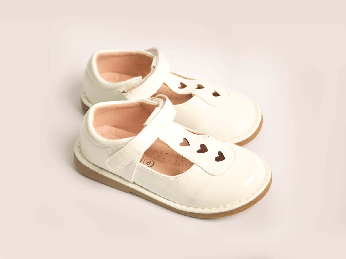 White Heart Strap Shoe girls shoe three-quarter angle — Little Giants